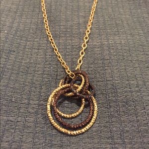 Rope chain pendent on gold chain